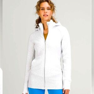 Lululemon radiant jacket with hood. Mint condition. Light grey color. Size 18